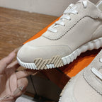 Hermes unisex sneakers outsole detail in light beige with striped tread and rubber ridges