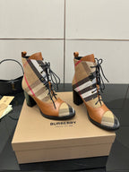 Tan Burberry check lace-up ankle boots with black laces and mid-height heel