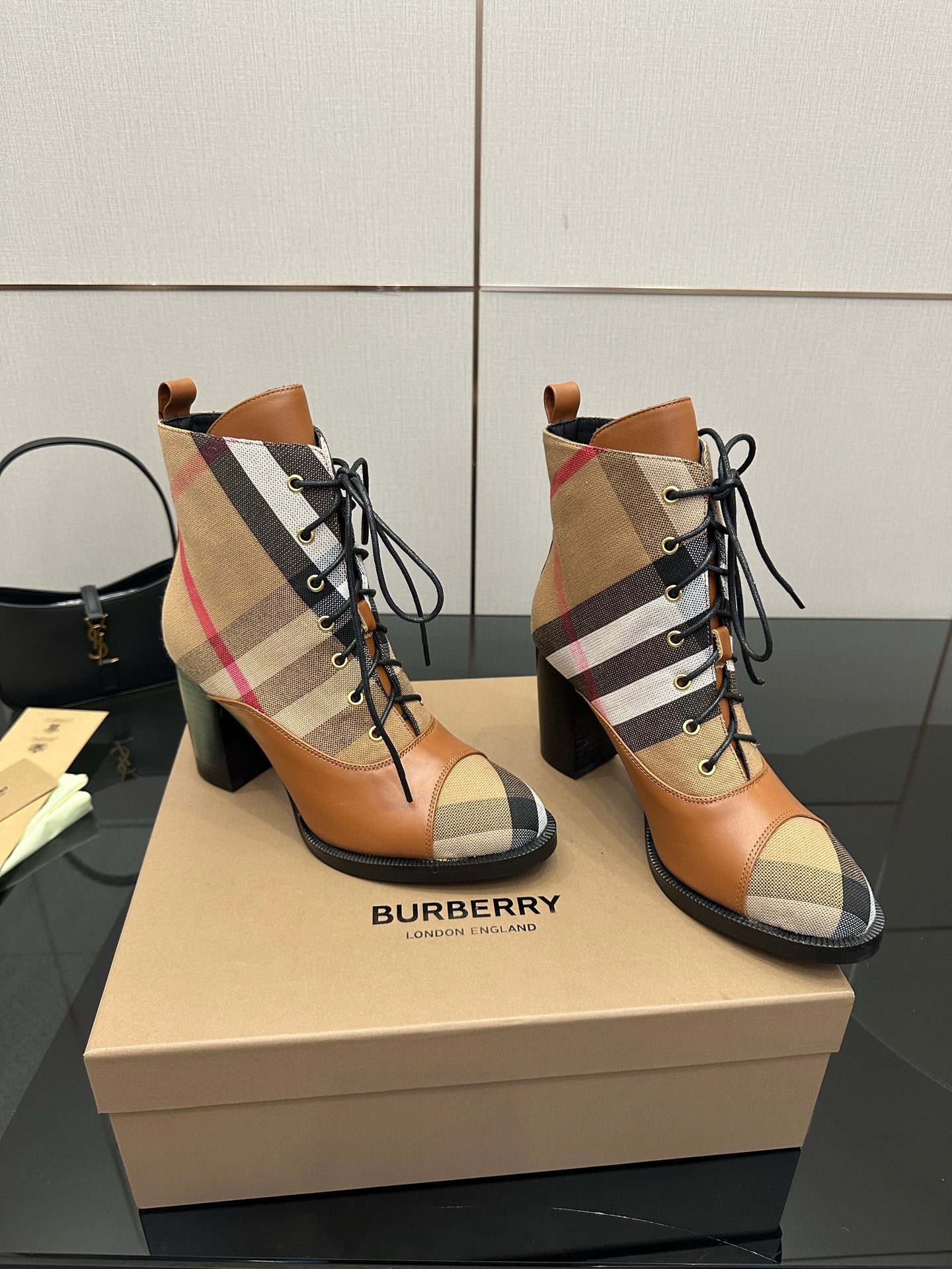 Tan Burberry check lace-up ankle boots with black laces and mid-height heel