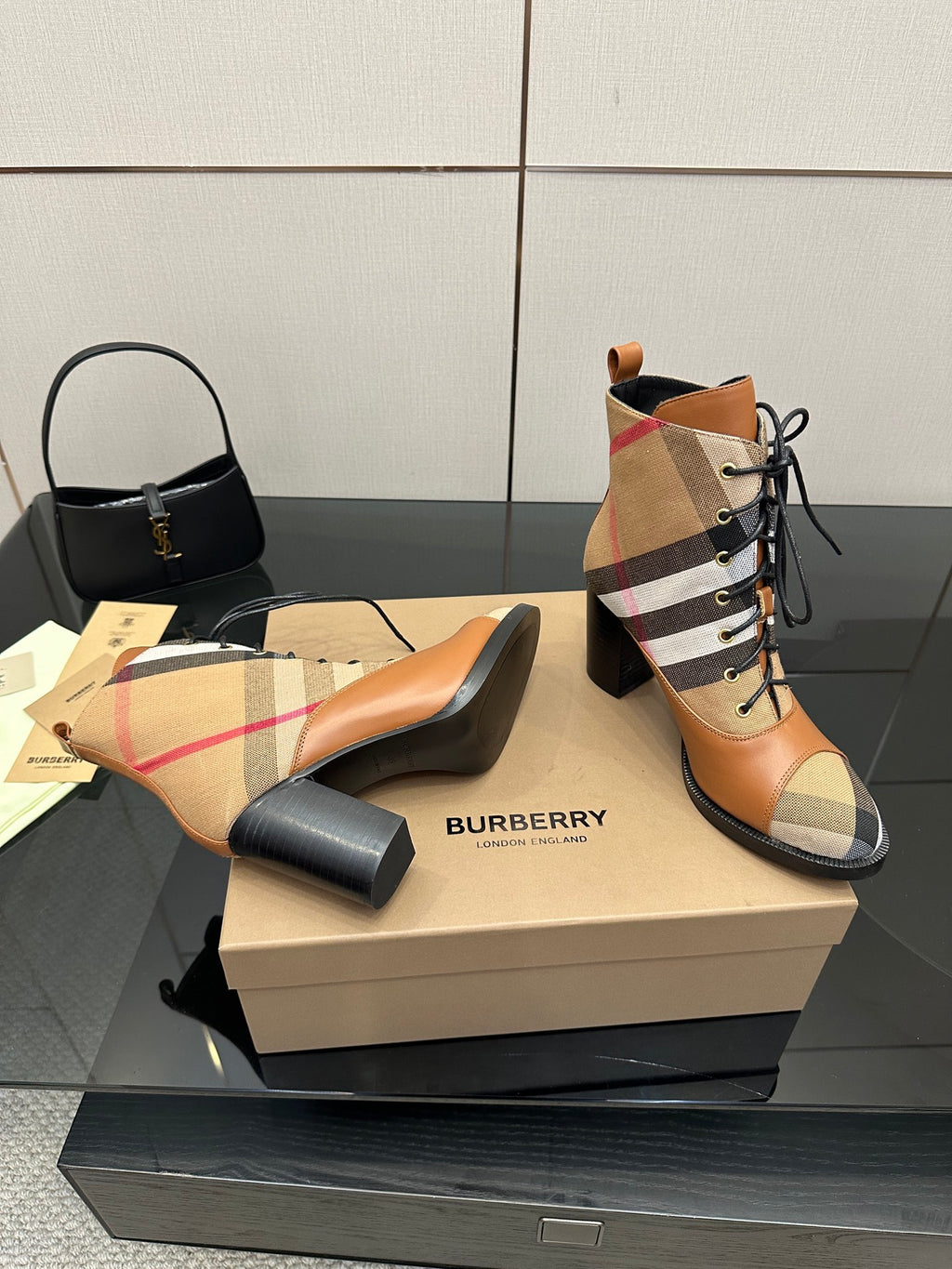 Tan and check lace-up ankle boots with black heel and rounded toe