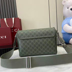 Gucci GG monogram flap shoulder bag with adjustable green strap and silver buckle