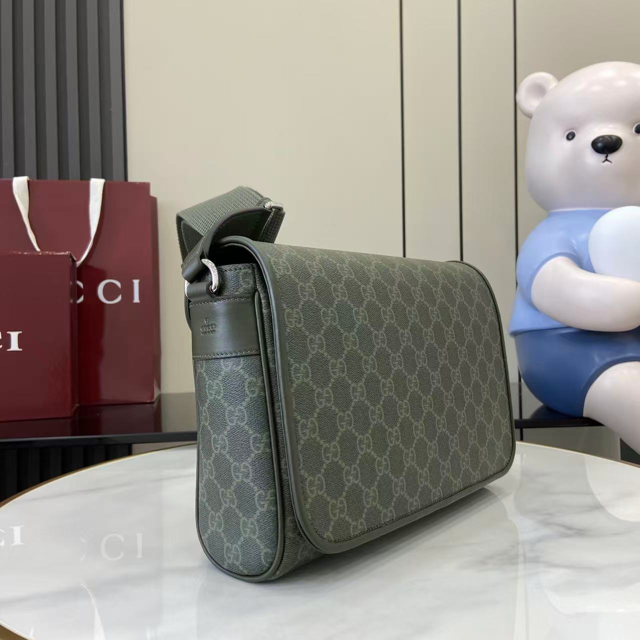 Gucci GG monogram crossbody bag with flap, green web strap, silver hardware