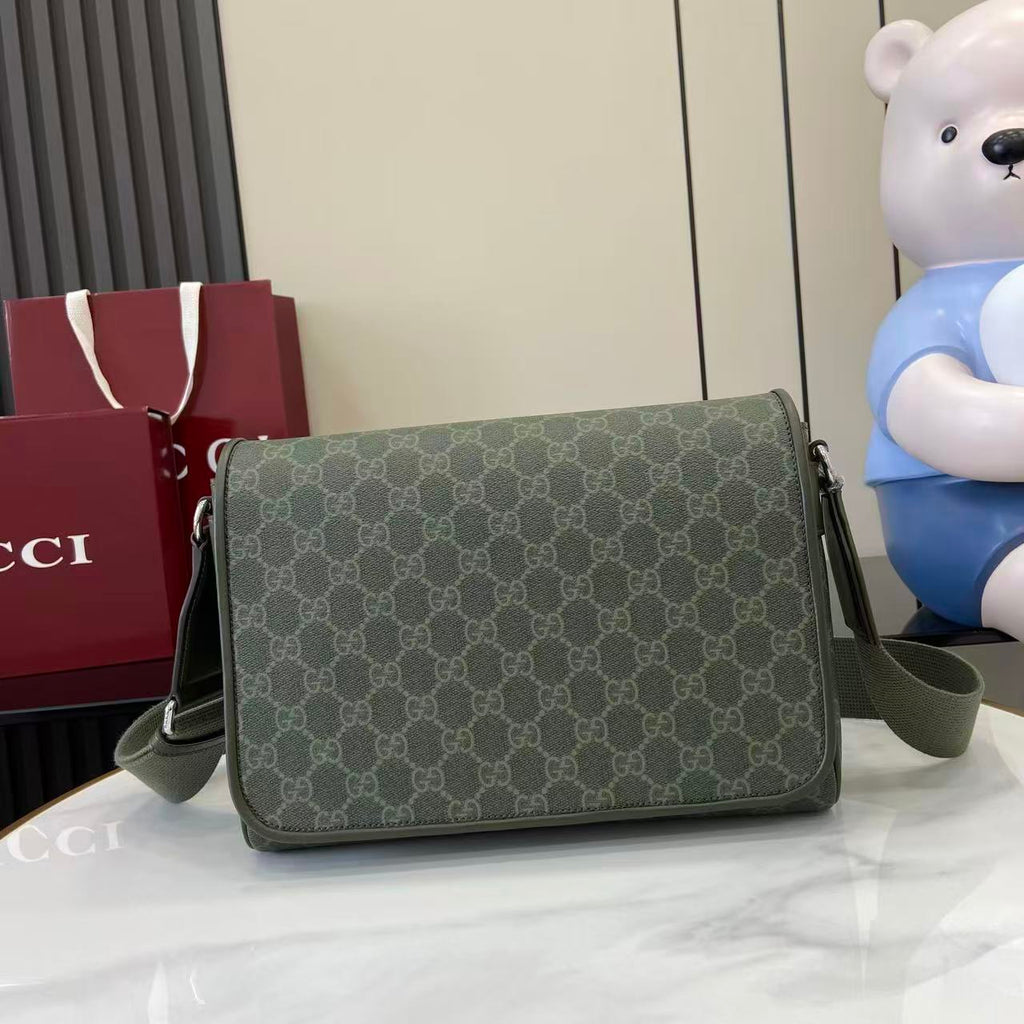Gucci GG monogram shoulder bag in olive green with flap and silver clasp