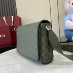 Gucci GG monogram flap bag side view with green leather trim and shoulder strap