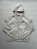 Prada hooded jacket in light beige, full zip, front logo and adjustable hood.