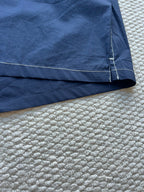 Men's navy hooded jacket hem with stitched seam and panel detail