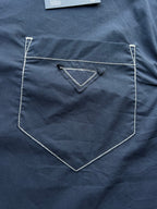 Men's navy jacket with triangular chest logo pocket detail