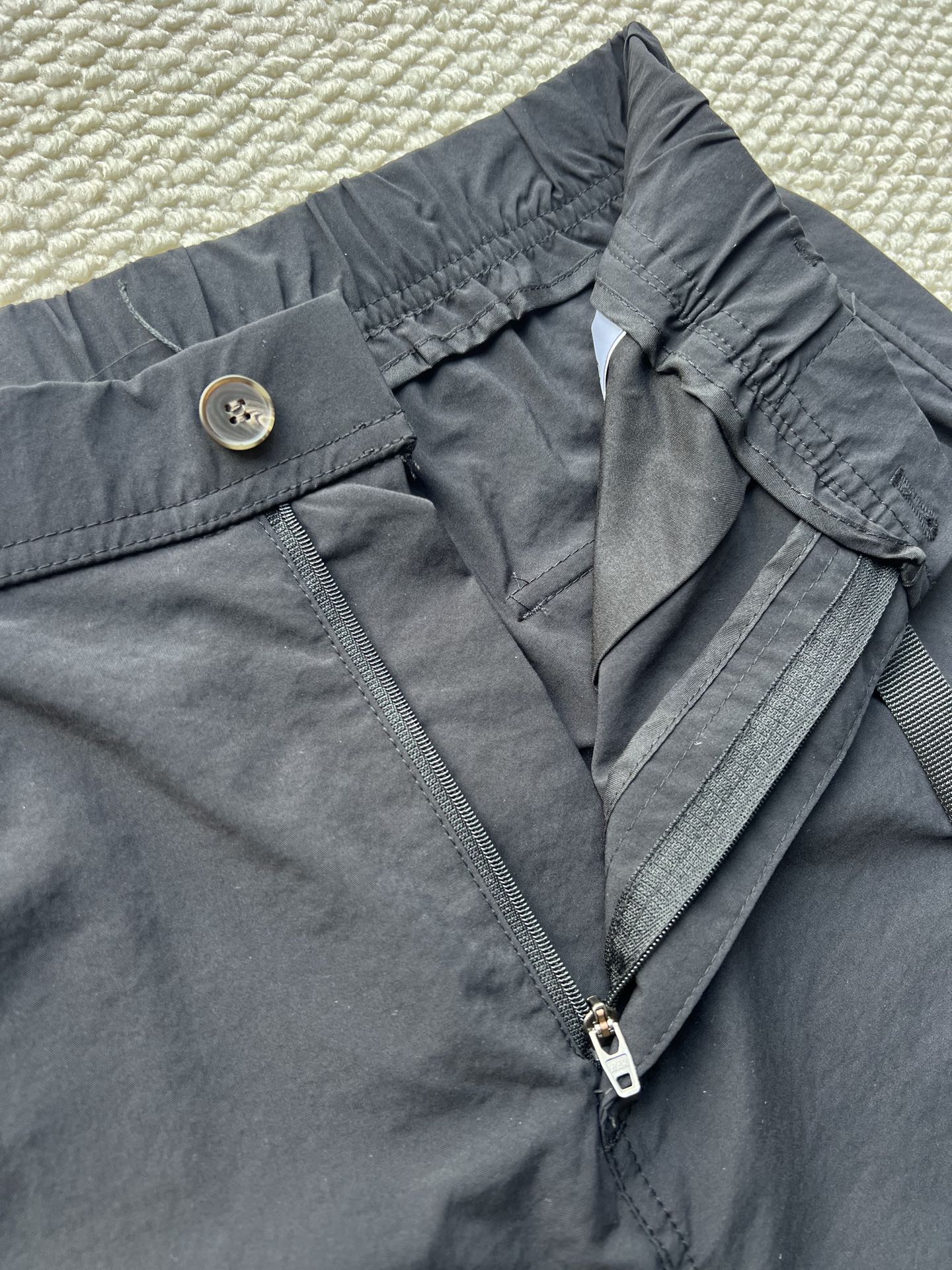 Stone Island cargo pants in dark navy with zipper fly and elastic waistband detail