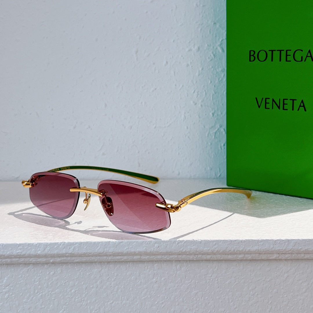 Bottega Veneta sunglasses with gold frame and pink tinted lenses, side view