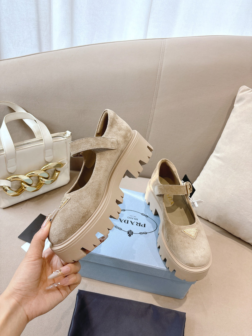 Prada ladies suede shoes, beige, angled view with strap buckle and lug sole