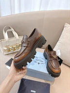 Prada ladies brown leather loafers with logo plaque strap and chunky lug platform sole