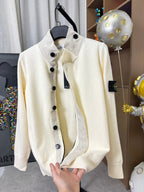 Stone Island knit cardigan, cream color, front view with stand collar and black buttons
