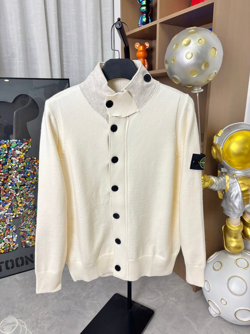 Stone Island knit cardigan, cream front with stand collar and five black buttons