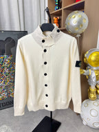 Stone Island knit cardigan, cream front with stand collar and five black buttons