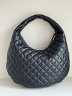 YSL quilted hobo bag with diamond stitching, dark leather-look, curved handle