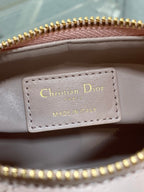 Christian Dior label inside Dior bag reading “MADE IN ITALY” with gold-printed text