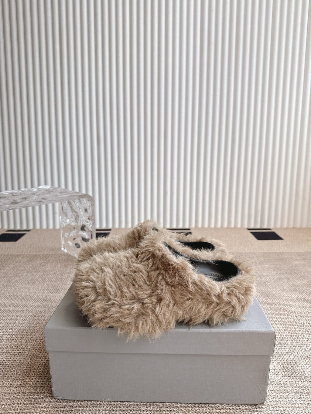 Balenciaga fuzzy beige slide sandals, open toe view on a shoe box