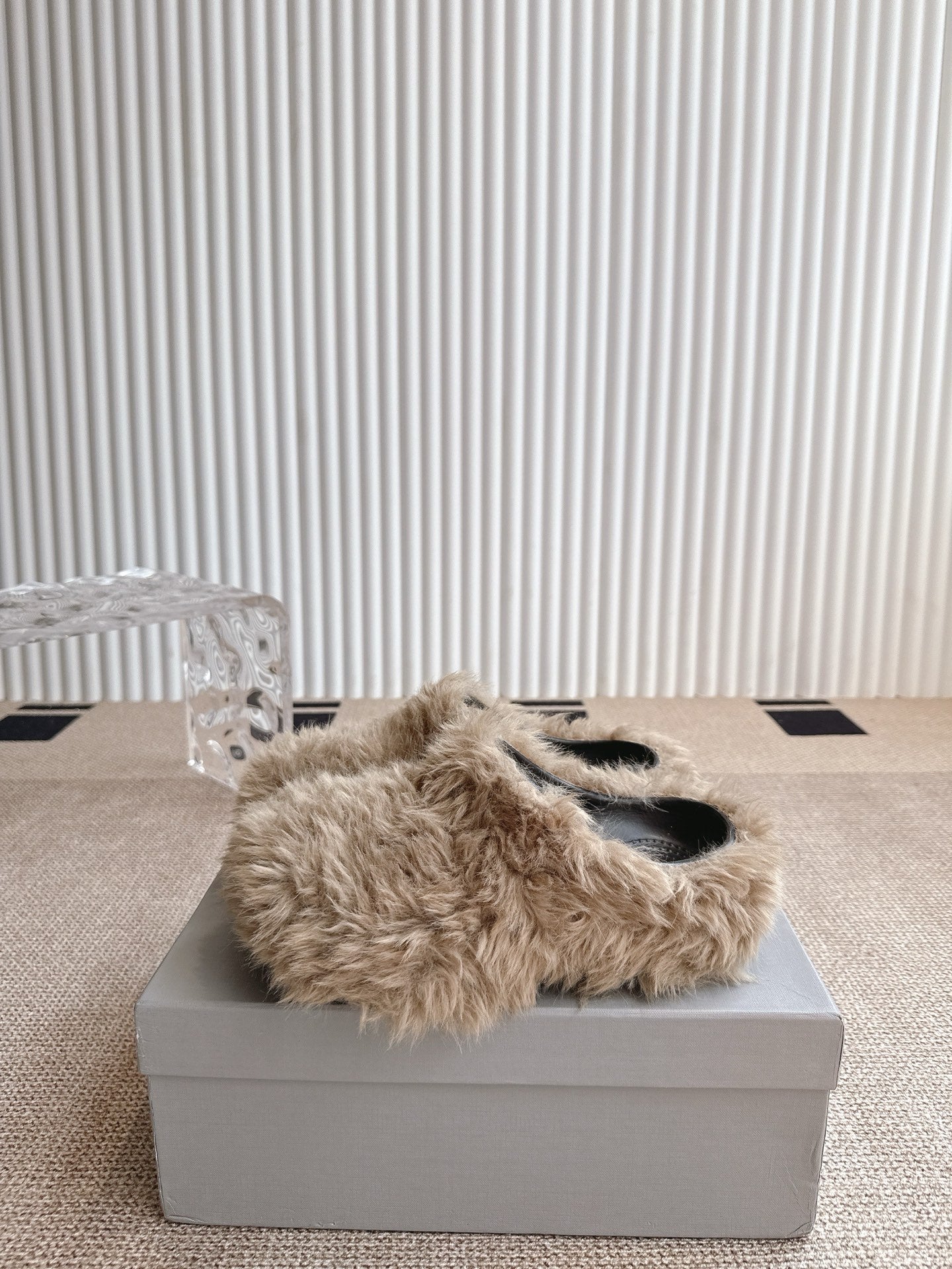 Balenciaga fuzzy beige slide sandals, open toe view on a shoe box