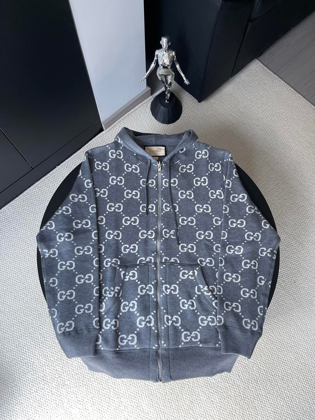 Gucci zip-up hoodie in dark gray with allover GG logo pattern and full front zipper