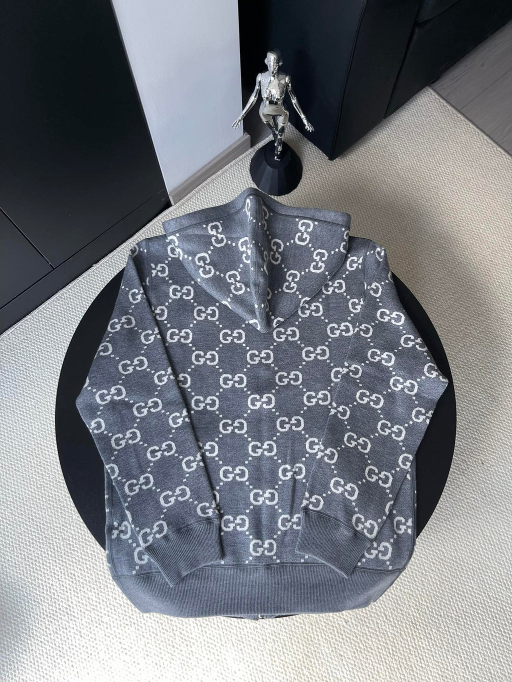 Gucci zip-up hoodie in dark gray with allover GG logo pattern and front zipper