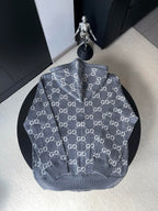 Gucci zip-up hoodie in dark gray with allover GG logo pattern and front zipper