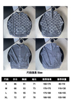 Gray Gucci long-sleeve pullover with repeating logo pattern