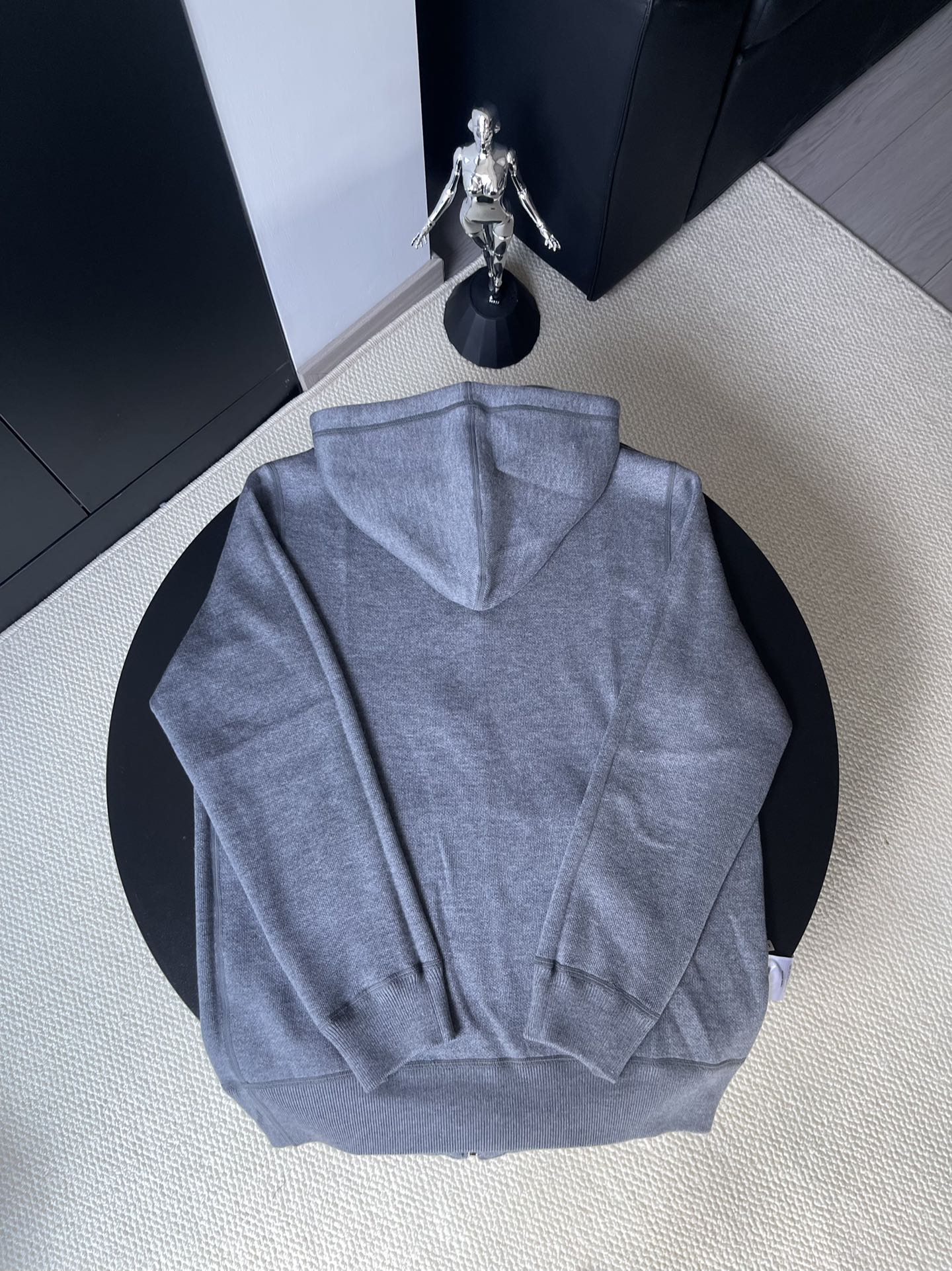 Gucci zip-up hoodie in medium blue-gray with attached hood, viewed from the back