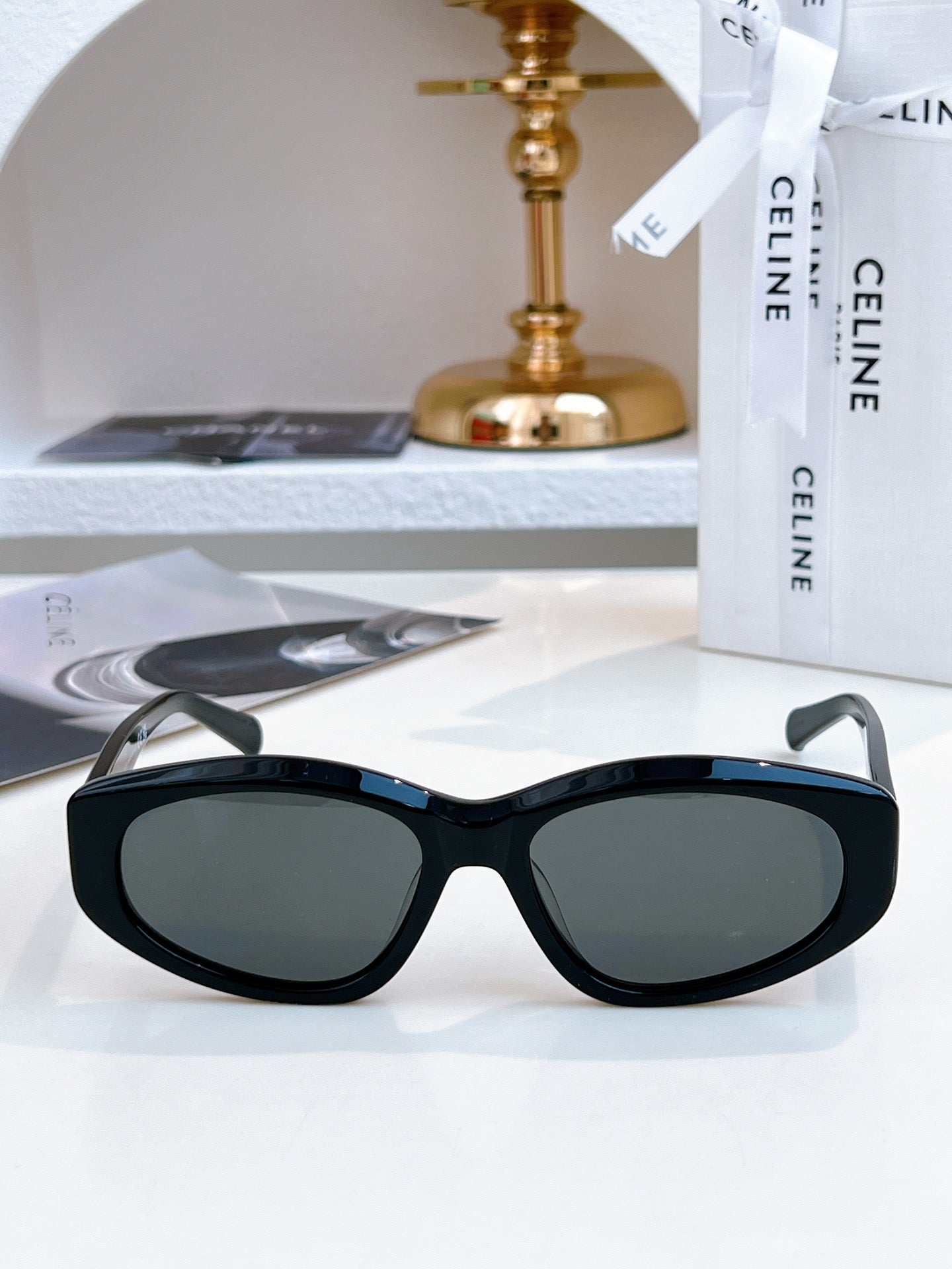 Sunglasses with black frame and dark lenses