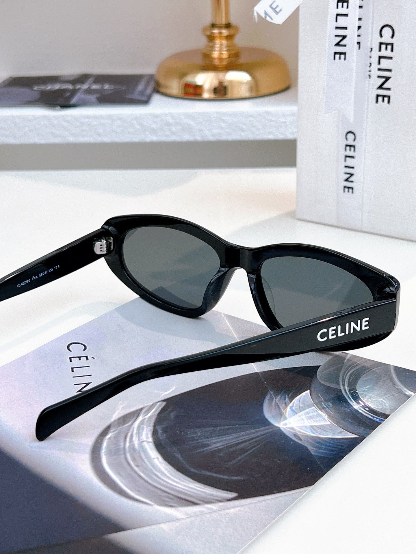Sunglasses with black frame and dark lenses
