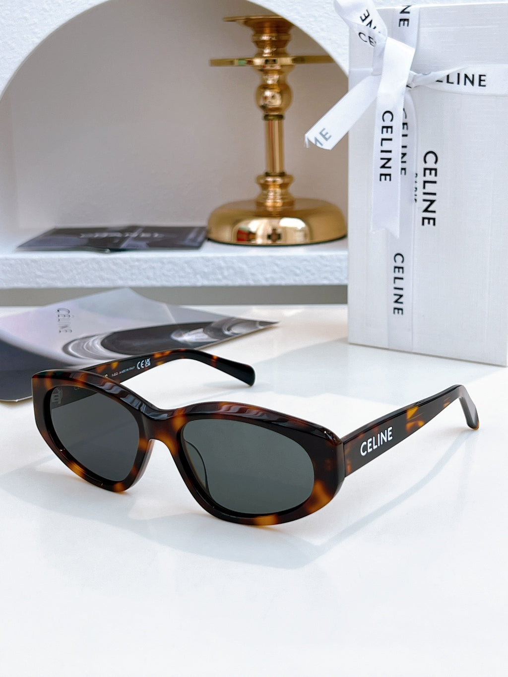 Dark tortoiseshell Celine sunglasses with black lenses