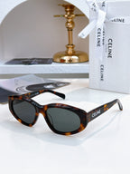 Dark tortoiseshell Celine sunglasses with black lenses