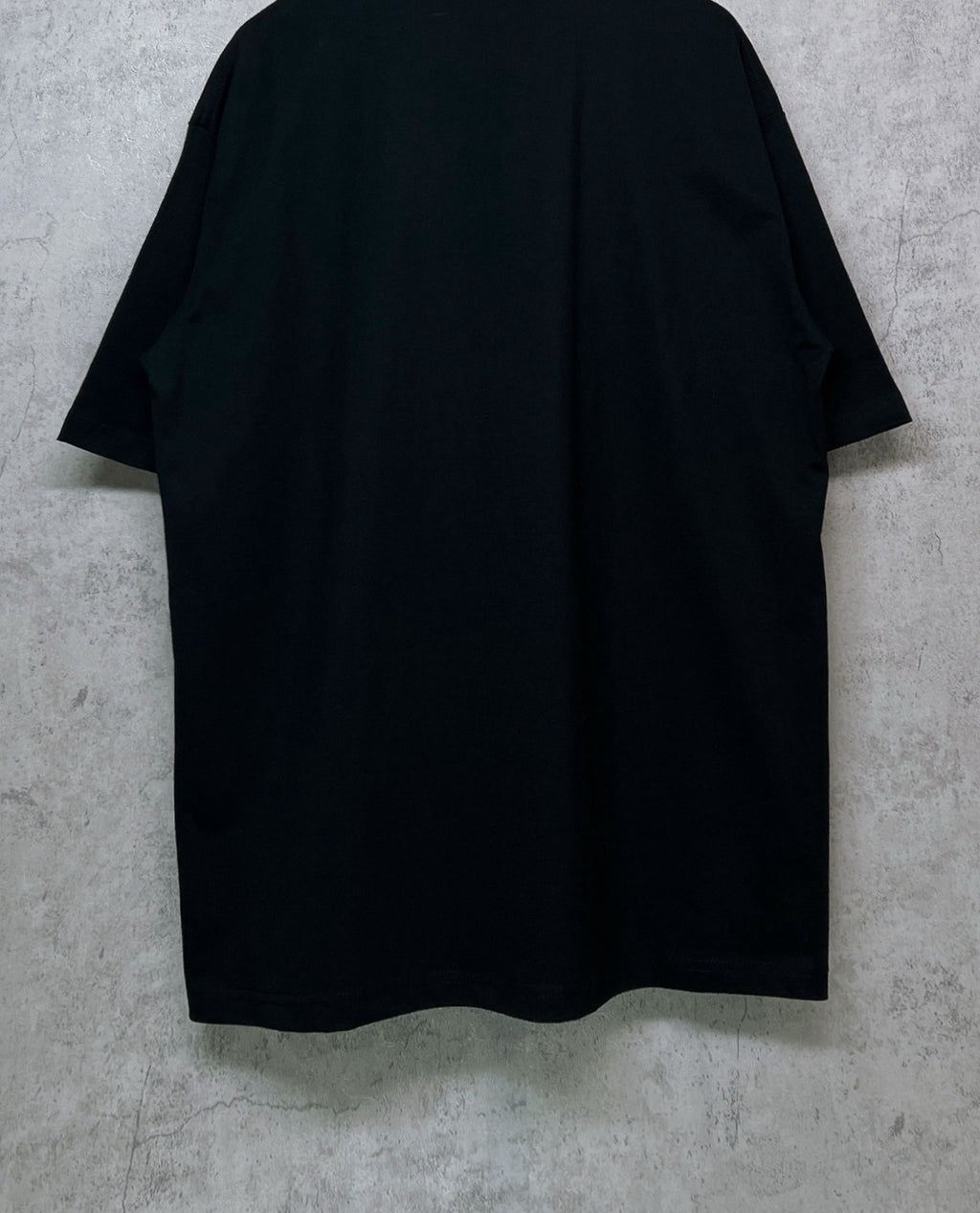 Black short-sleeve T-shirt, plain back view