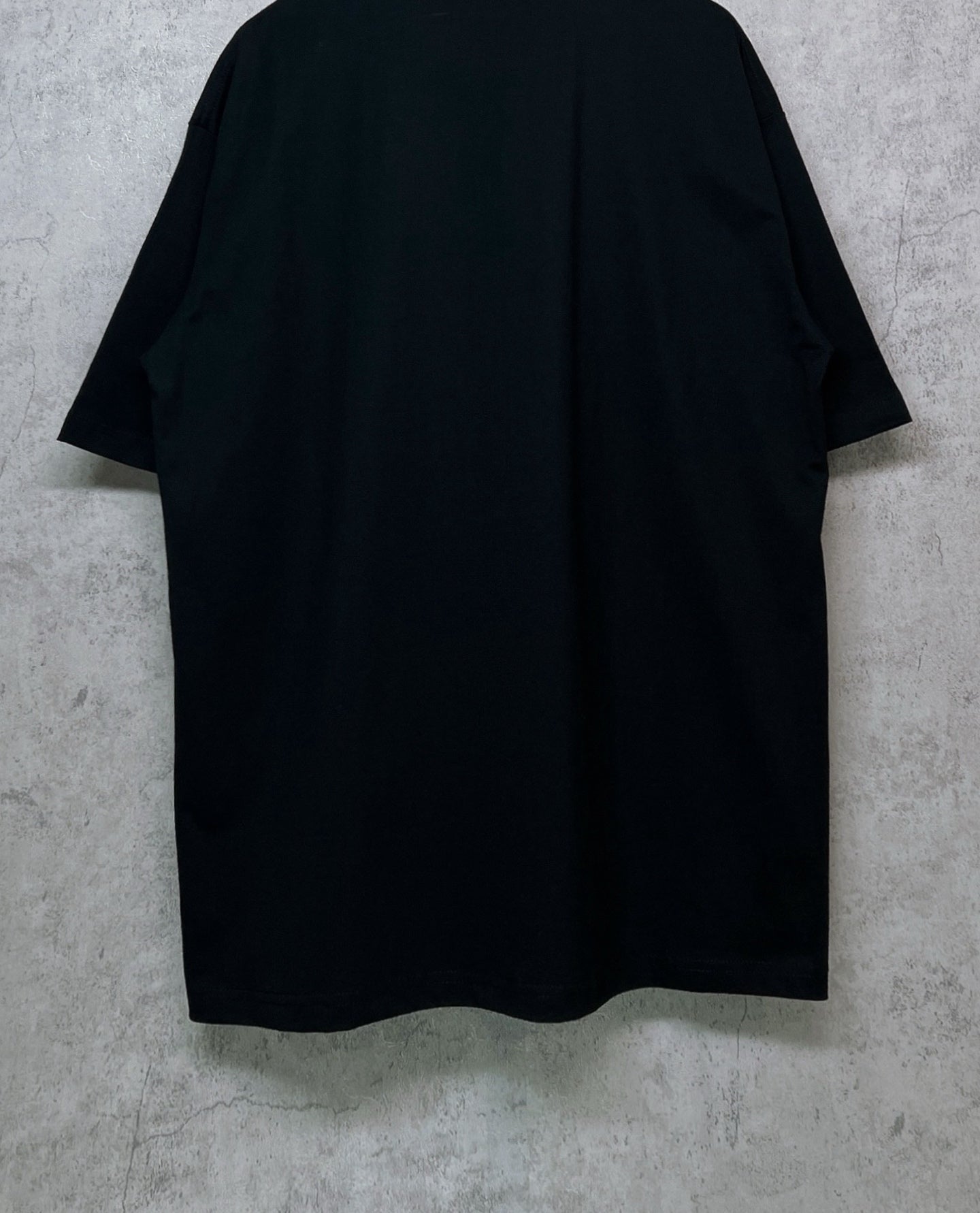 Black short-sleeve T-shirt, plain back view