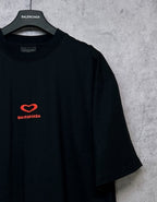 Black Balenciaga T-shirt with red heart logo on left chest