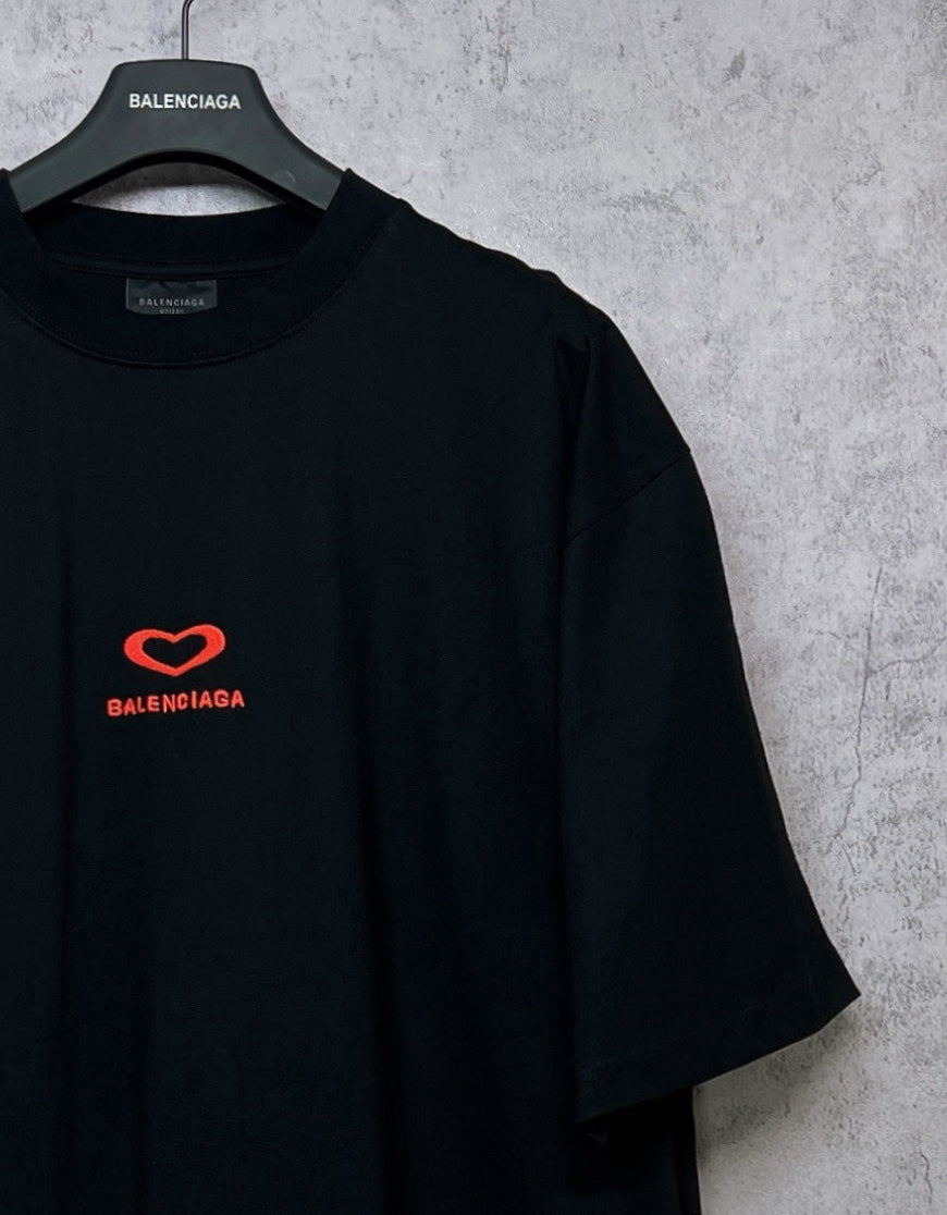 Black Balenciaga T-shirt with red heart logo on left chest