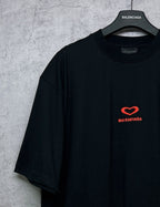 Black Balenciaga T-shirt with red heart logo on right chest