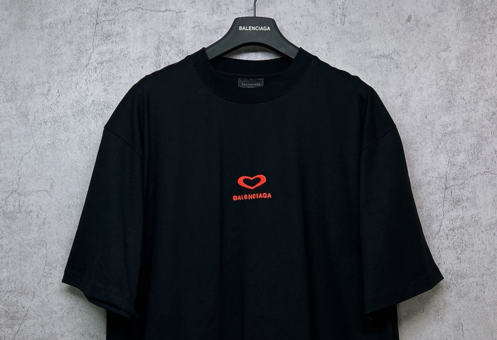 Black Balenciaga T-shirt with small red heart logo on chest