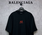 Black Balenciaga T-shirt with red heart logo on chest