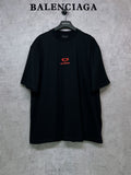Black Balenciaga T-shirt with small red heart logo on chest