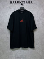 Black Balenciaga T-shirt with small red heart logo on chest