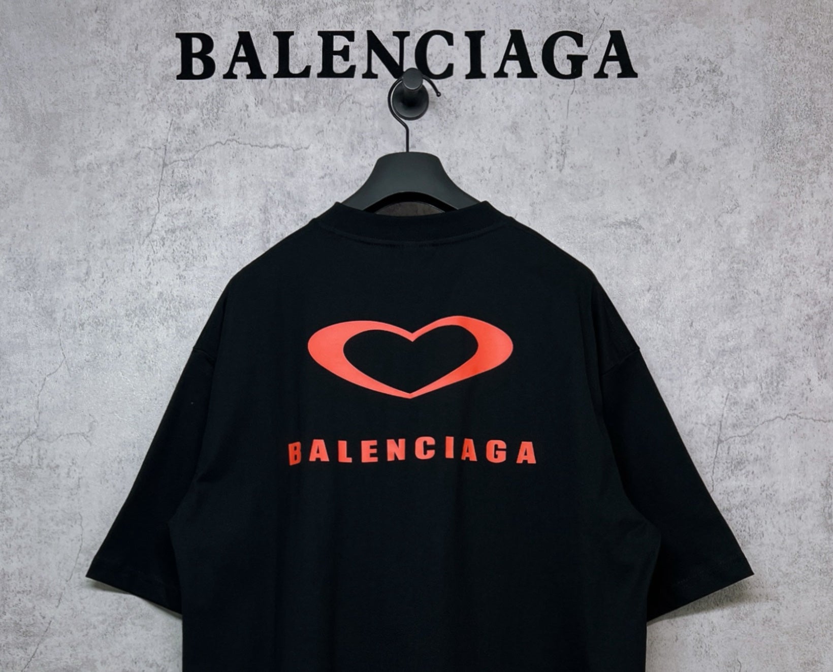 Black Balenciaga T-shirt with large red heart logo on back