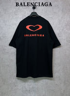 Black Balenciaga T-shirt with large red heart logo on back
