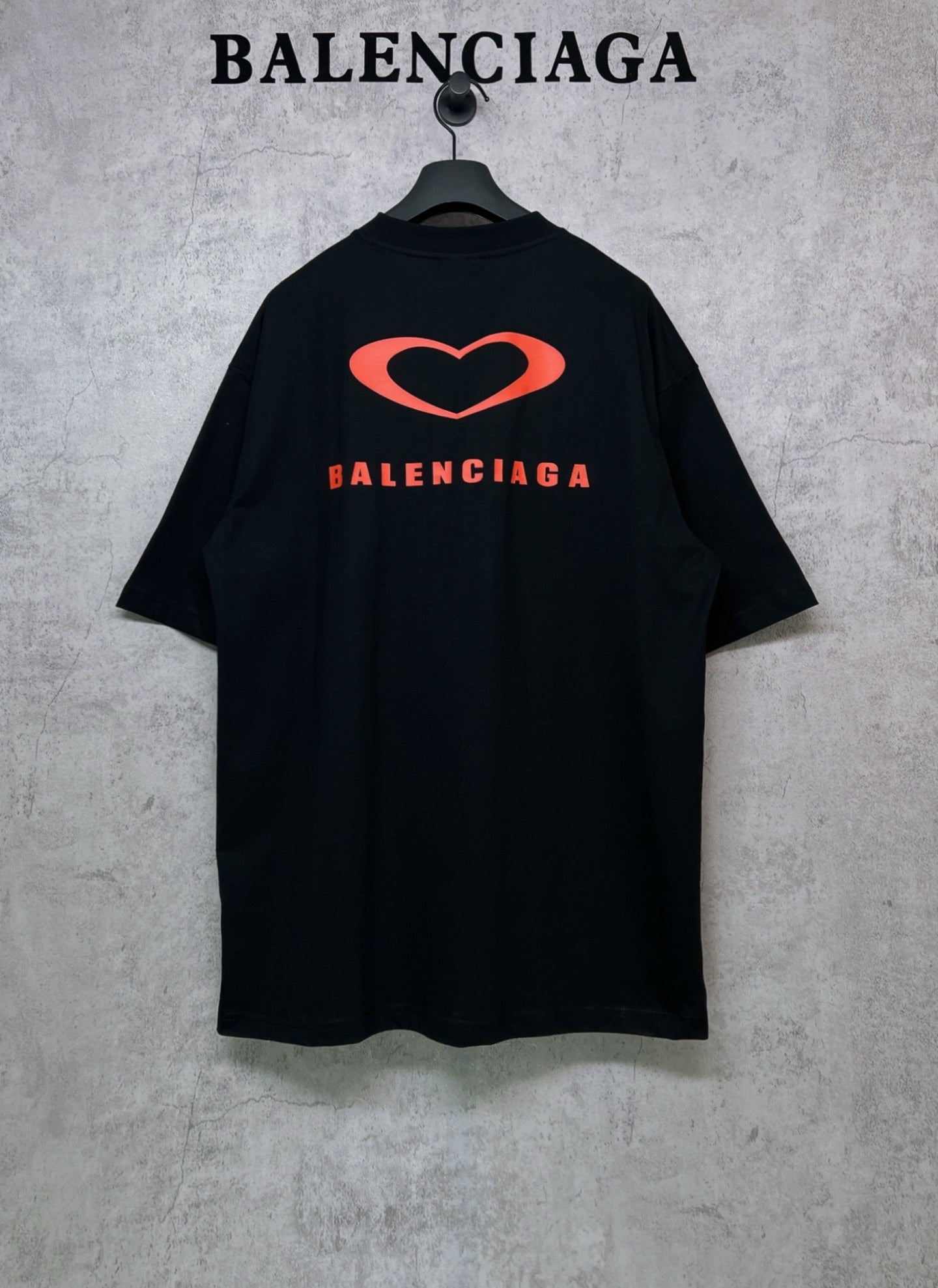 Black Balenciaga T-shirt with large red heart logo on back
