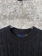 Ralph Lauren cable-knit sweater neckline with Polo label, ribbed crew collar