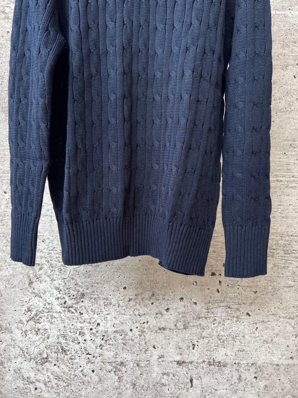 Navy cable-knit long-sleeve sweater, solid knit back