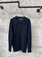 Navy cable-knit polo sweater with collared neckline and three button placket