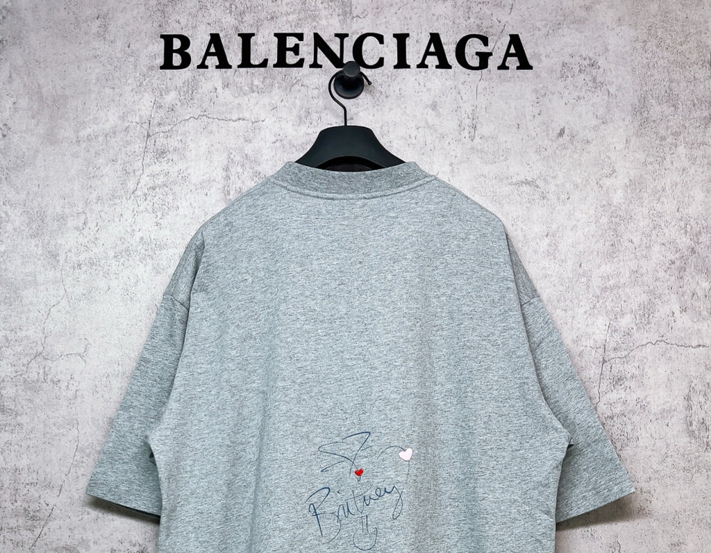 Balenciaga heather gray T-shirt back view with small signature-style graphic