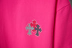 Pink short-sleeve T-shirt with small rhinestone cross emblem detail
