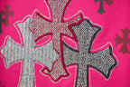 Pink short-sleeve T-shirt close-up of rhinestone cross print