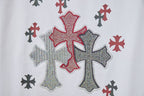 White T-shirt with large rhinestone-style cross graphic in red, gray, and white